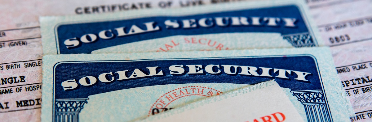Social security card on top of vital records