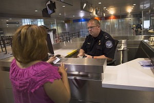 cbp officer inspects expired green card at port of entry
