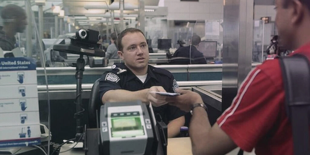 CBP officer discusses green card abandonment with permanent resident traveler