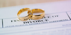 Wedding rings sit on I-751 waiver after divorce