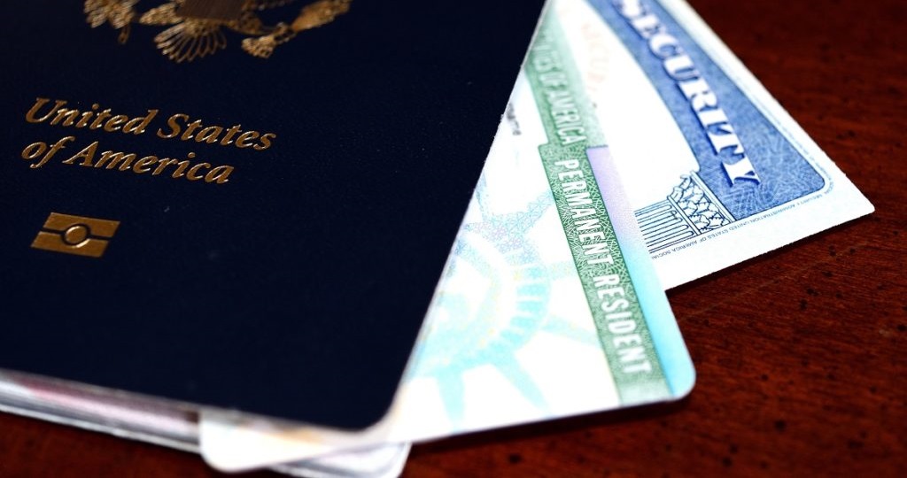 US documents symbolizing path to permanent resident status through the green card lottery