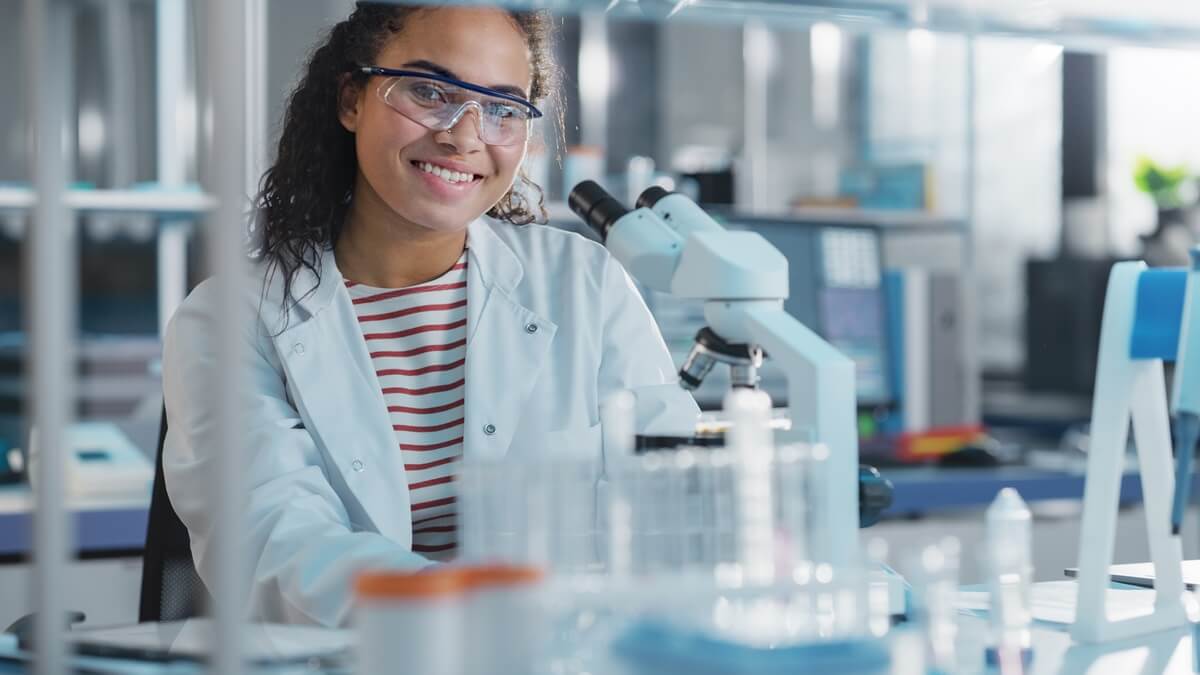 Student in lab prepares to go from F-1 to green card status