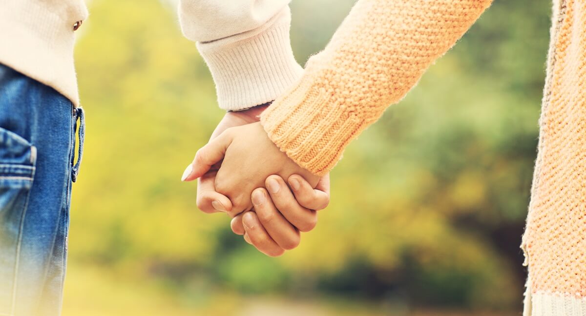 Couple holds hands - Marriage validity for immigration purposes